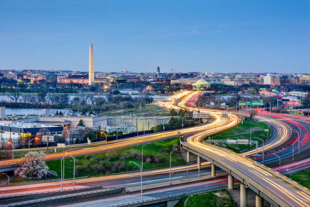 Washington, DC skyline of monuments and highways.